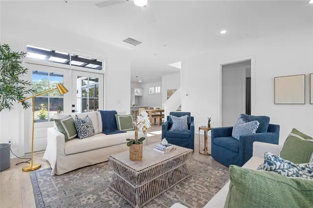 a living room with furniture and a table
