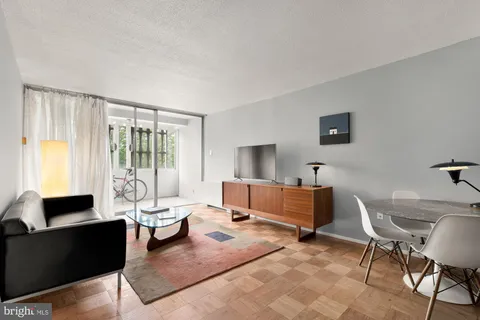 a living room with furniture and a couch