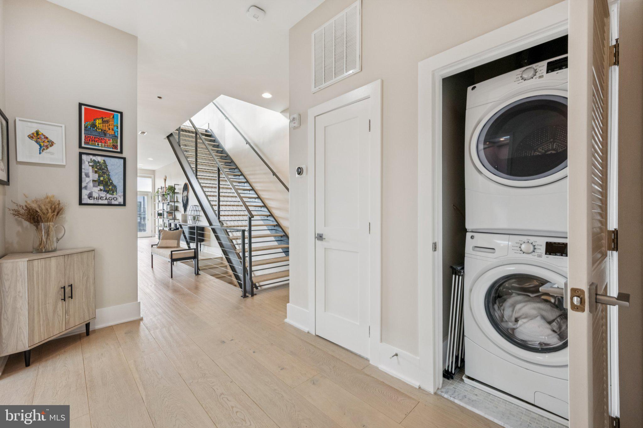 1316 Shepherd Street Northwest, Unit 4 Washington, DC 20011 - Photo 19 of 25 a view of a hallway with washer and dryer