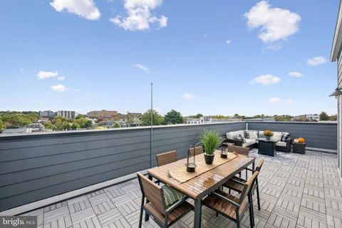 a view of a terrace with furniture