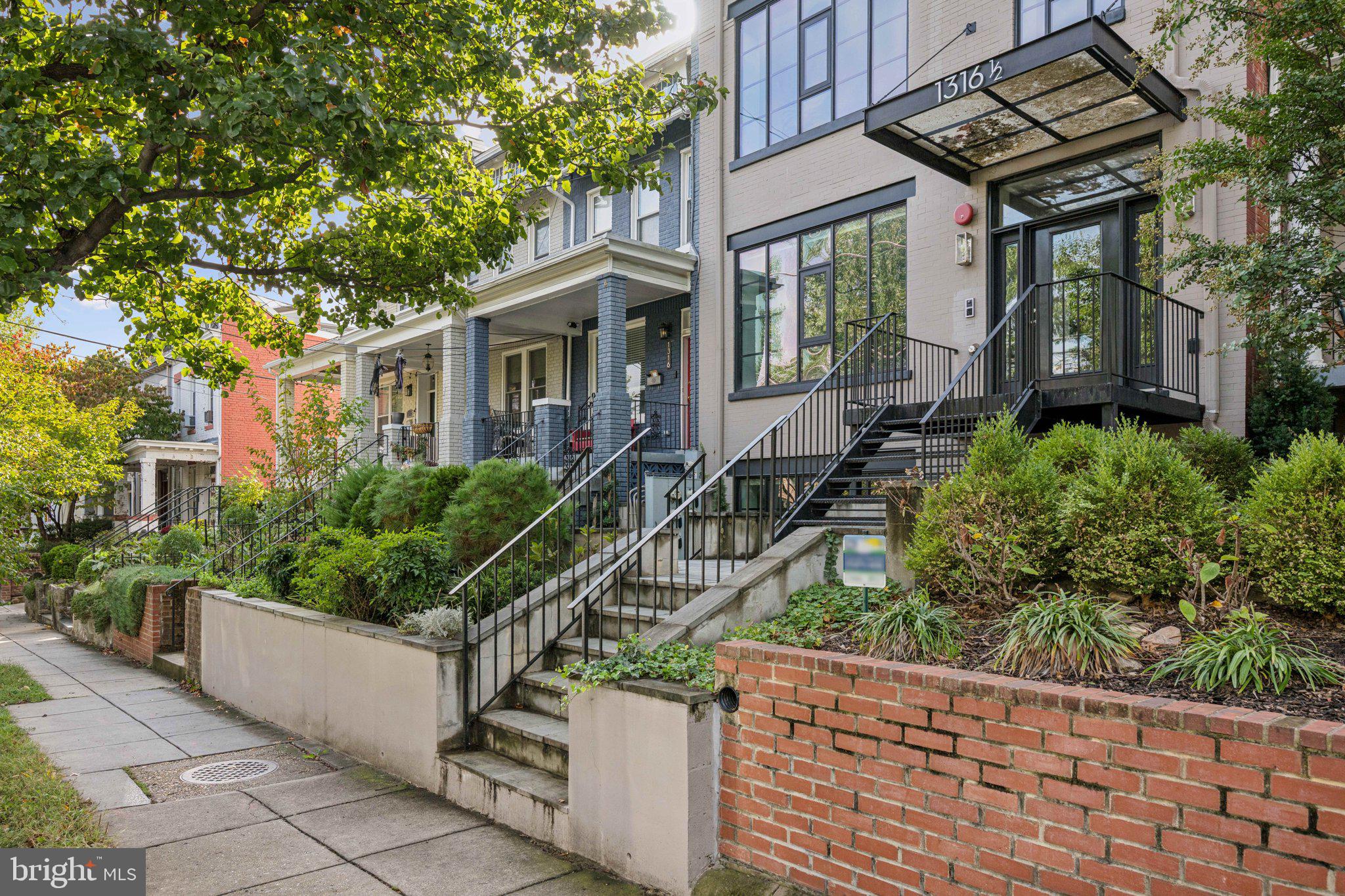 1316 Shepherd Street Northwest, Unit 4 Washington, DC 20011 - Photo 24 of 25 a front view of a house with a garden