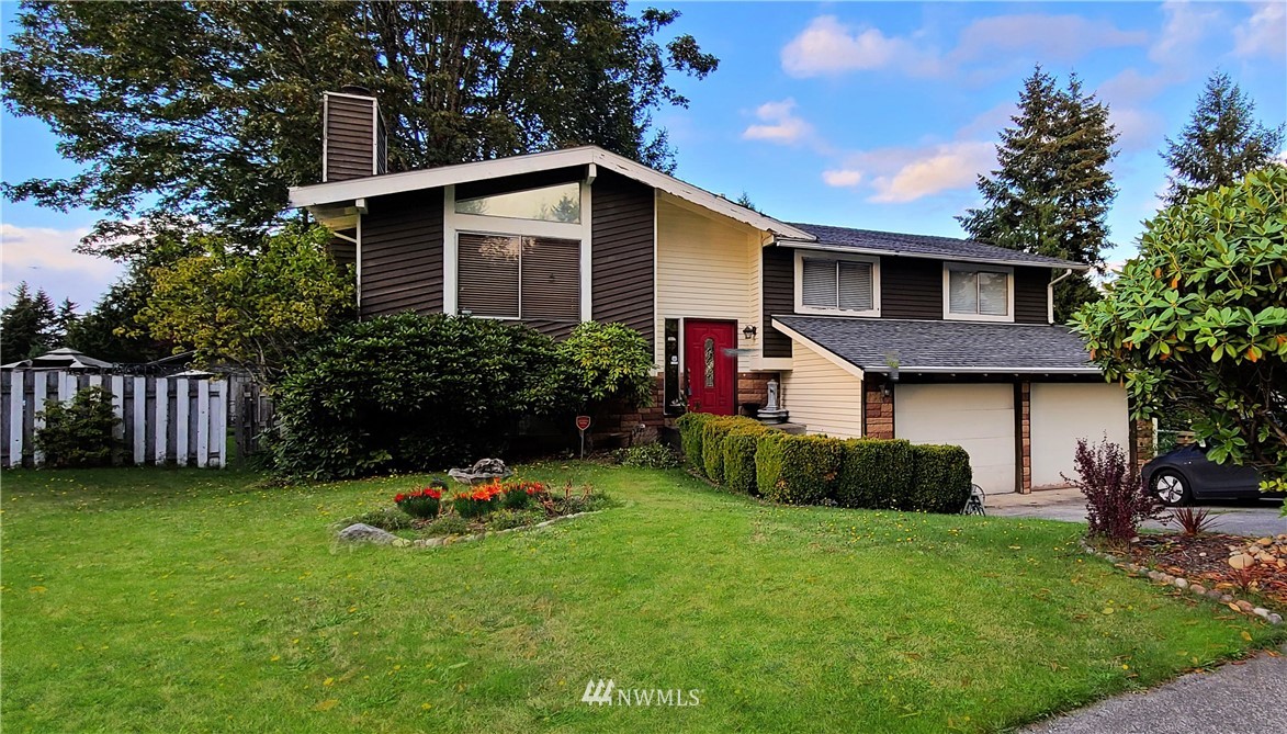 2304 Southeast 21st Street Renton, WA 98055 - Photo 2 of 19 a view of a house with a yard and plants
