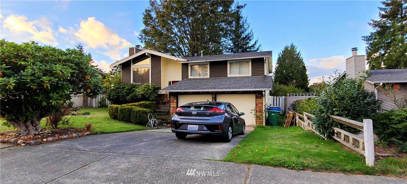 2304 Southeast 21st Street Renton, WA 98055 - Photo 3 of 19 a house view with a garden space