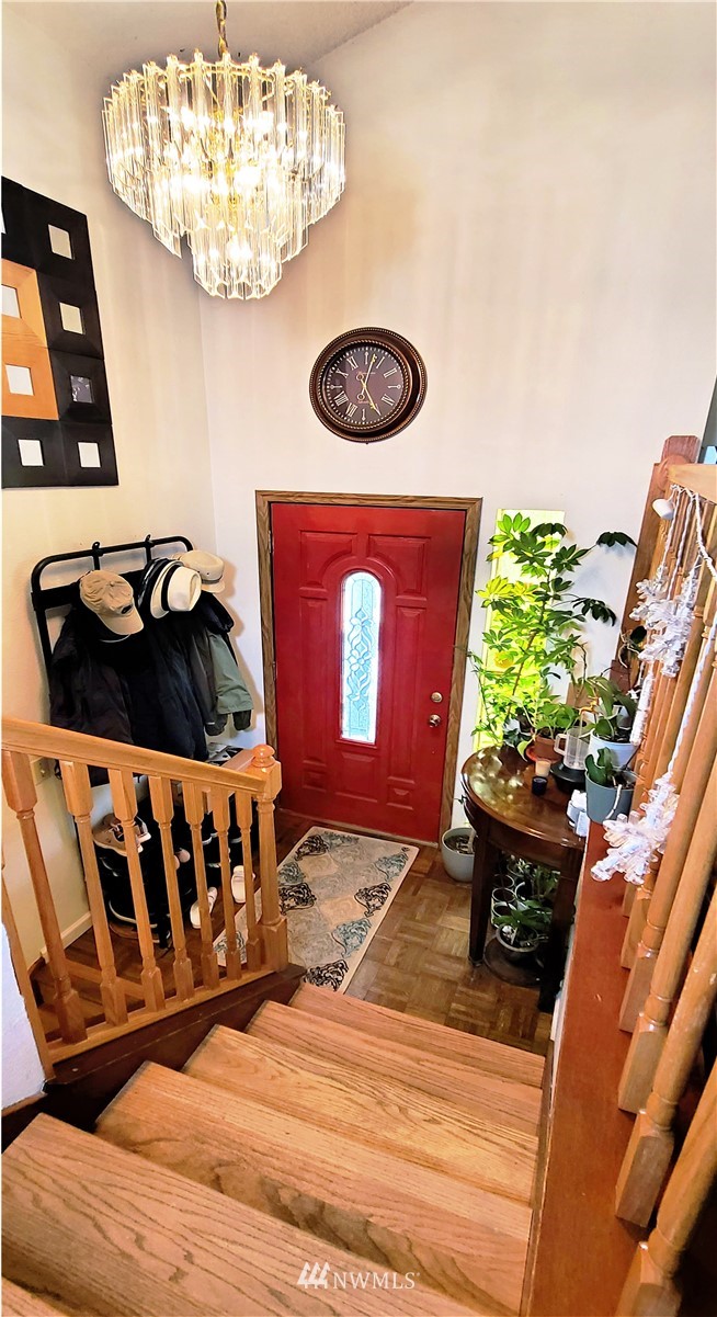 2304 Southeast 21st Street Renton, WA 98055 - Photo 7 of 19 a view of entryway with wooden floor