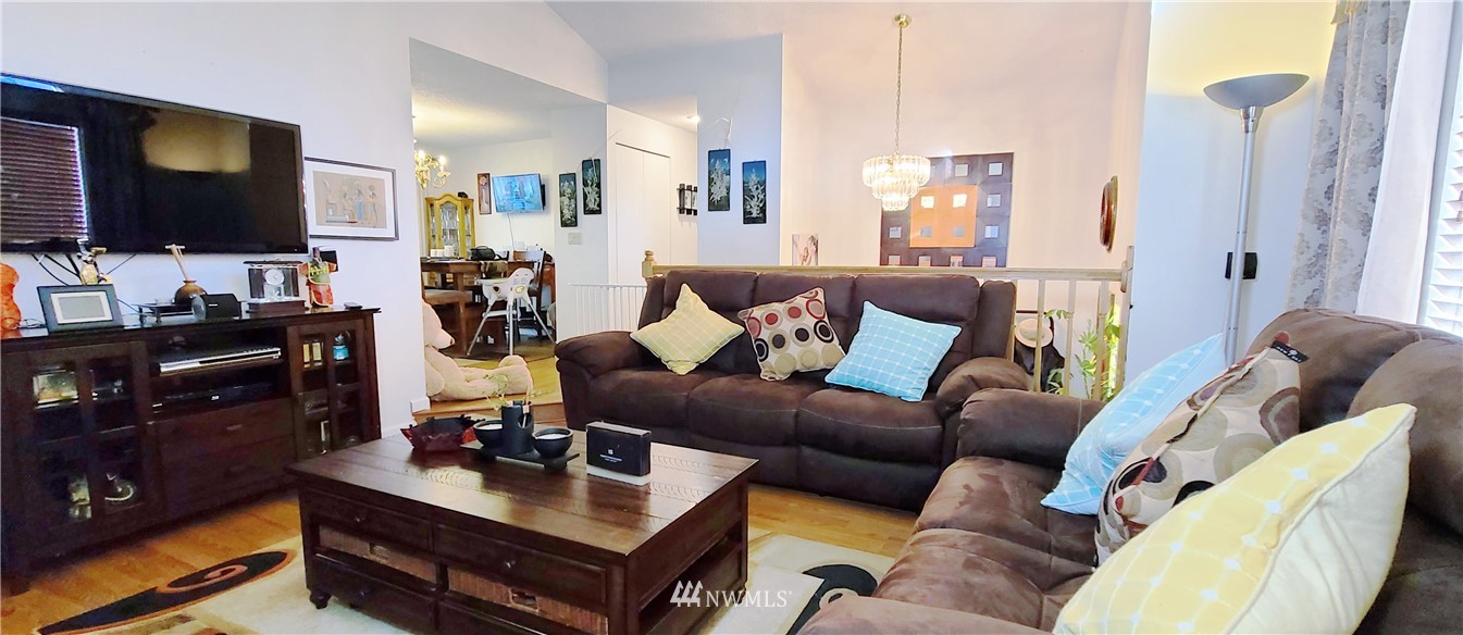 2304 Southeast 21st Street Renton, WA 98055 - Photo 10 of 19 a living room with furniture and a flat screen tv