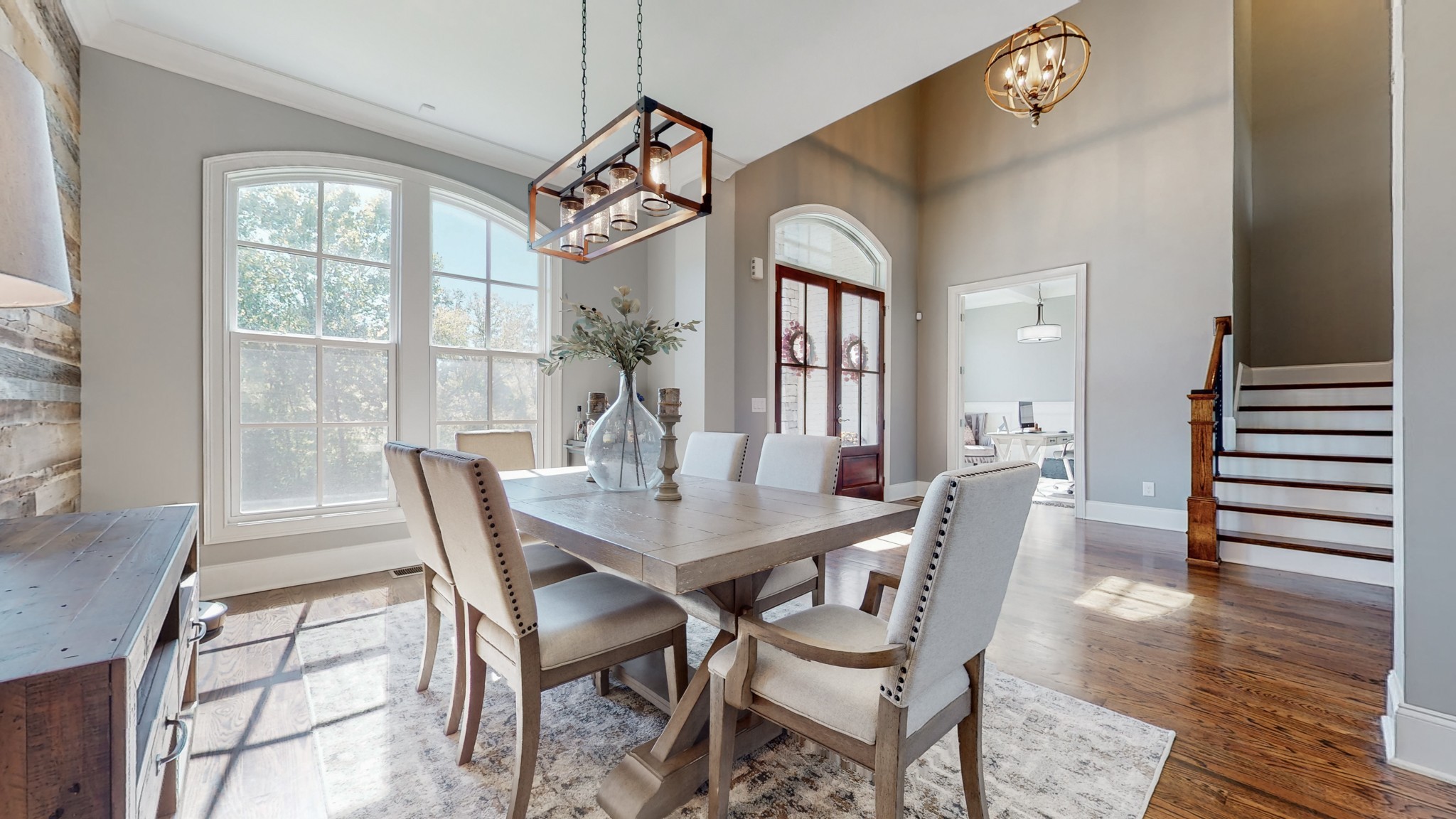 6023 Lookaway Circle Franklin, TN 37067 - Photo 12 of 50 a view of a dining room with furniture window and wooden floor