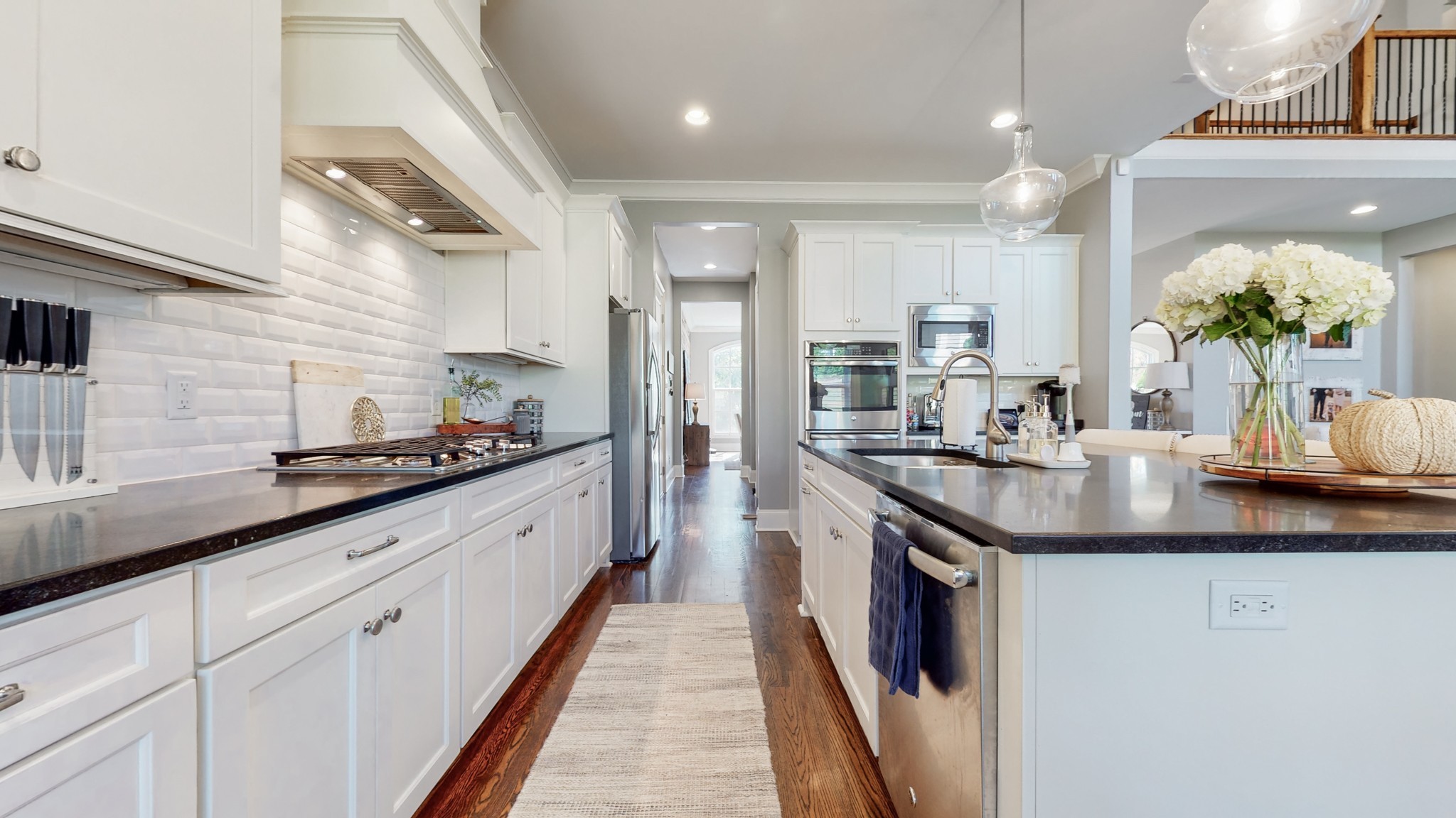 6023 Lookaway Circle Franklin, TN 37067 - Photo 20 of 50 a large kitchen with granite countertop a sink and cabinets