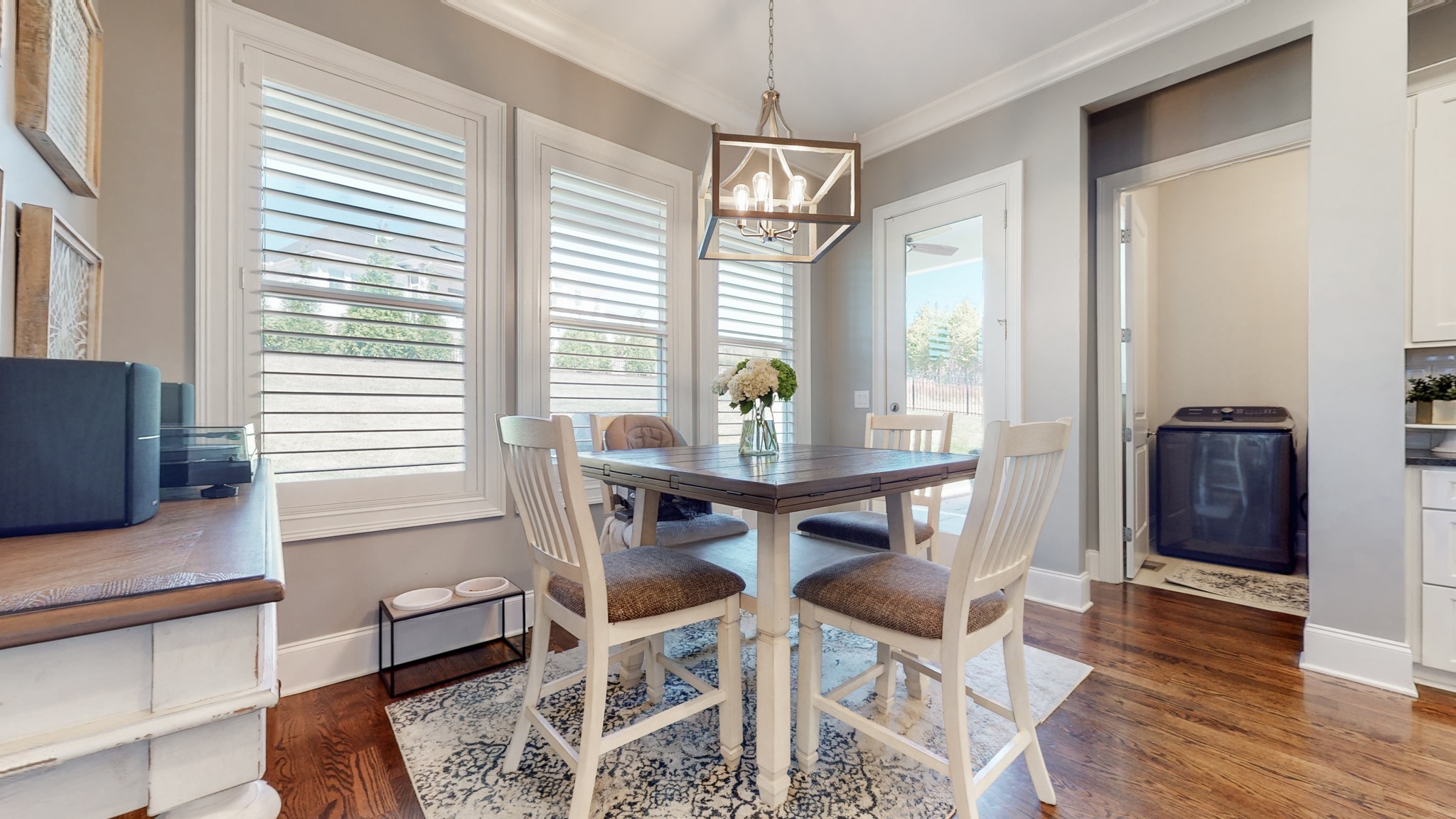 6023 Lookaway Circle Franklin, TN 37067 - Photo 23 of 50 a view of a dining room with furniture and wooden floor