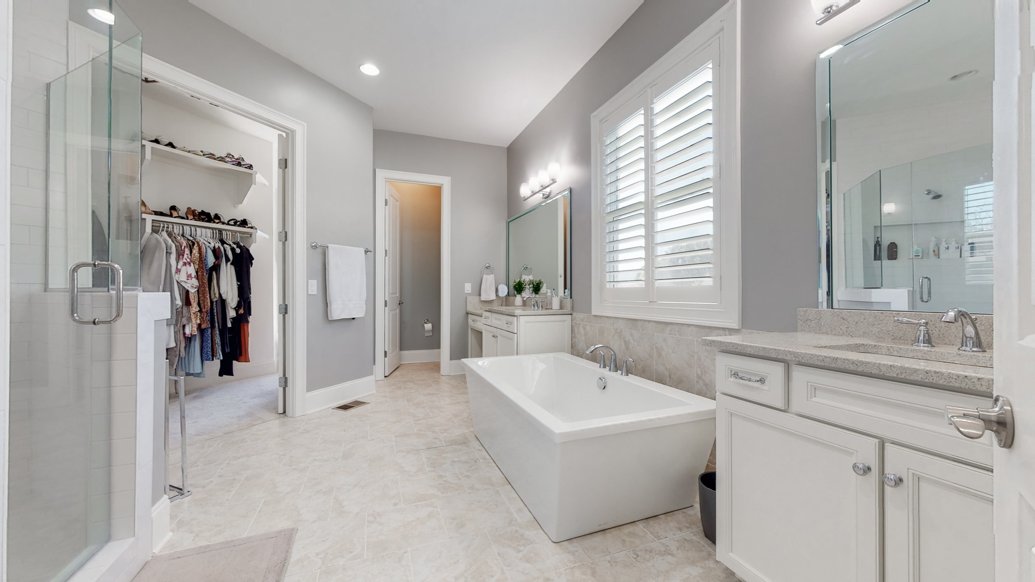 6023 Lookaway Circle Franklin, TN 37067 - Photo 27 of 50 a bathroom with a tub sink and mirror