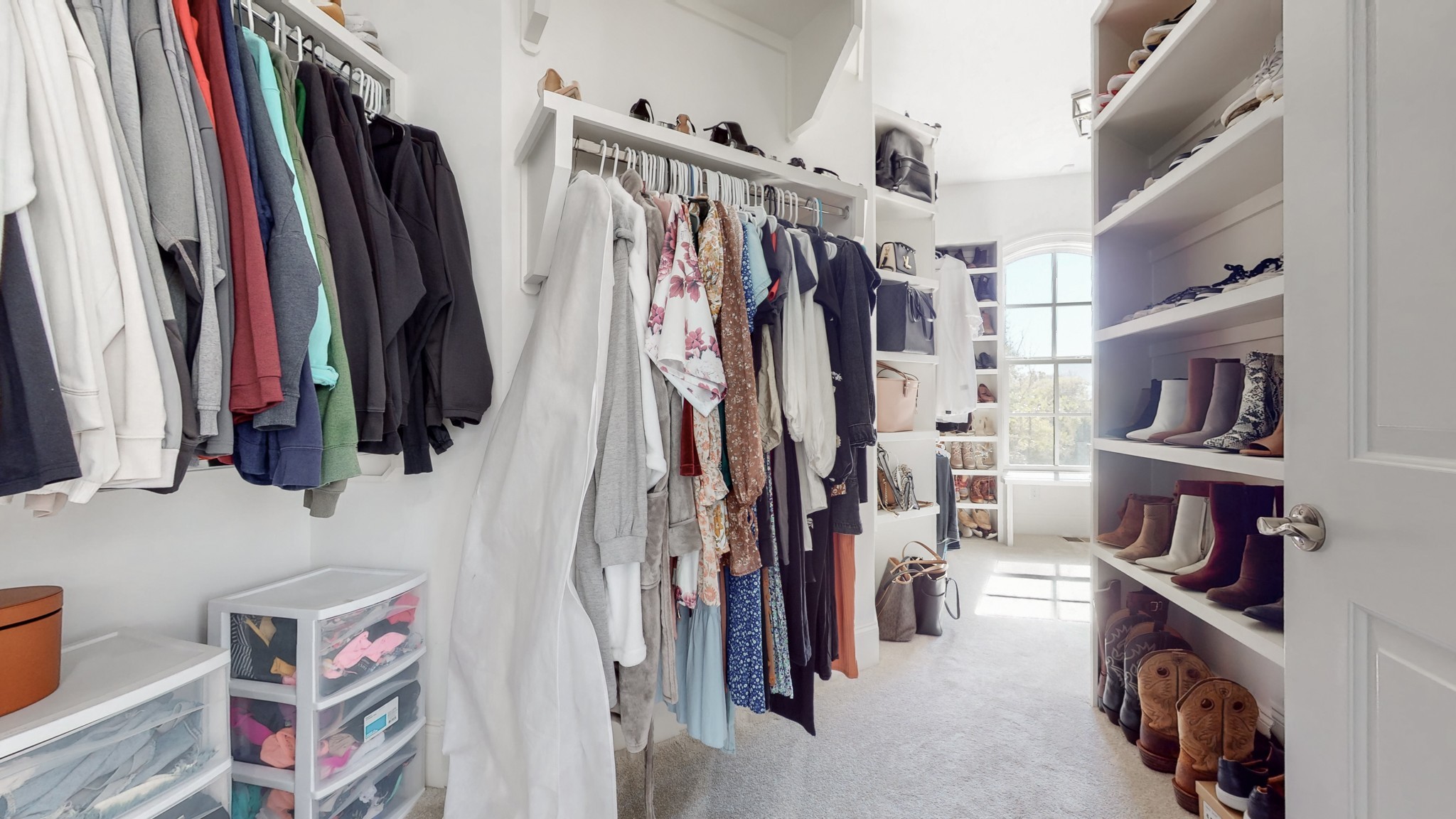 6023 Lookaway Circle Franklin, TN 37067 - Photo 30 of 50 a view of walk in closet with clothes and shoes