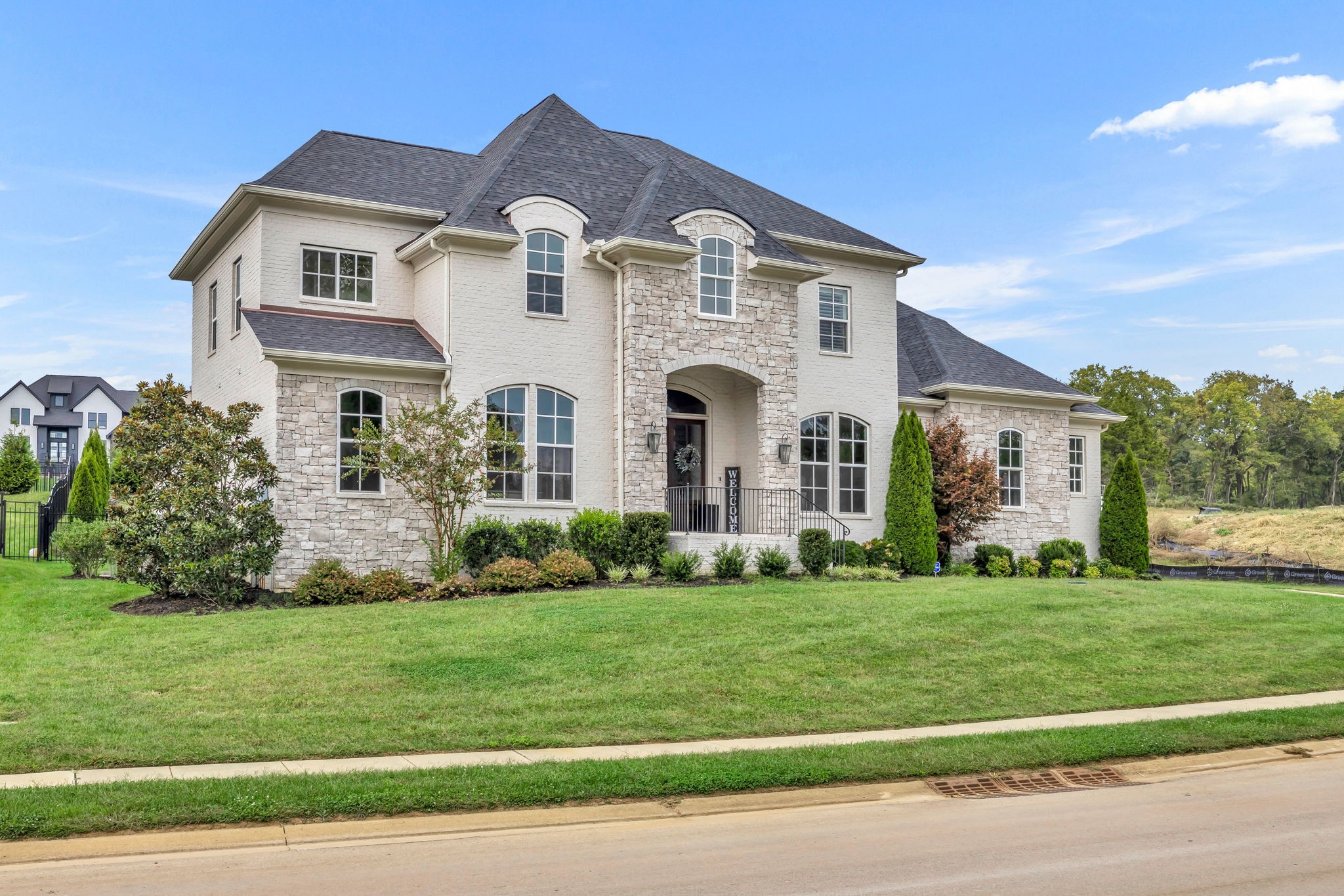 6023 Lookaway Circle Franklin, TN 37067 - Photo 3 of 50 a front view of a house with a yard
