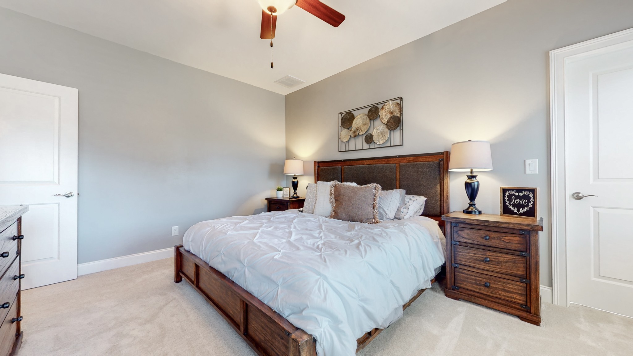 6023 Lookaway Circle Franklin, TN 37067 - Photo 32 of 50 a bedroom with a bed and a lamp on the dresser