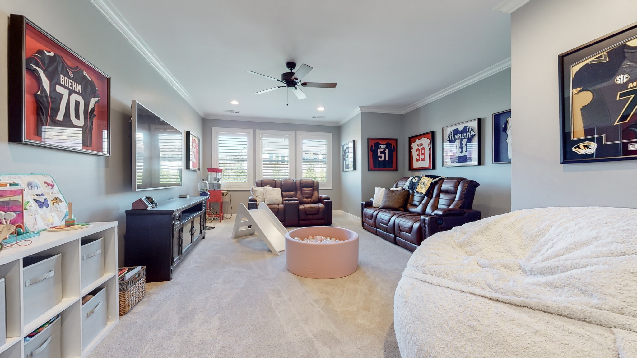 6023 Lookaway Circle Franklin, TN 37067 - Photo 34 of 50 a living room with furniture and a baby crib