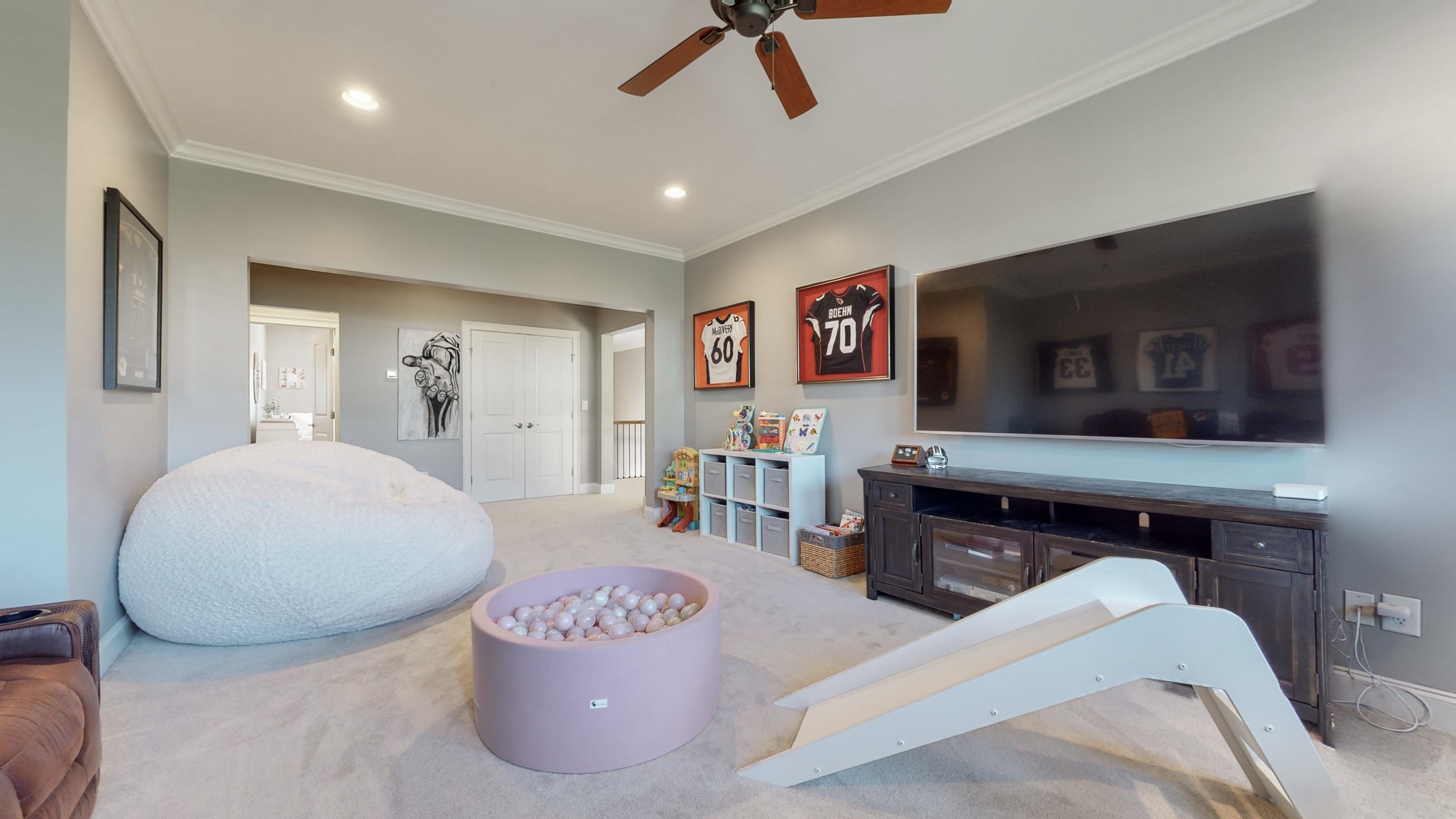 6023 Lookaway Circle Franklin, TN 37067 - Photo 36 of 50 a living room with furniture and a flat screen tv