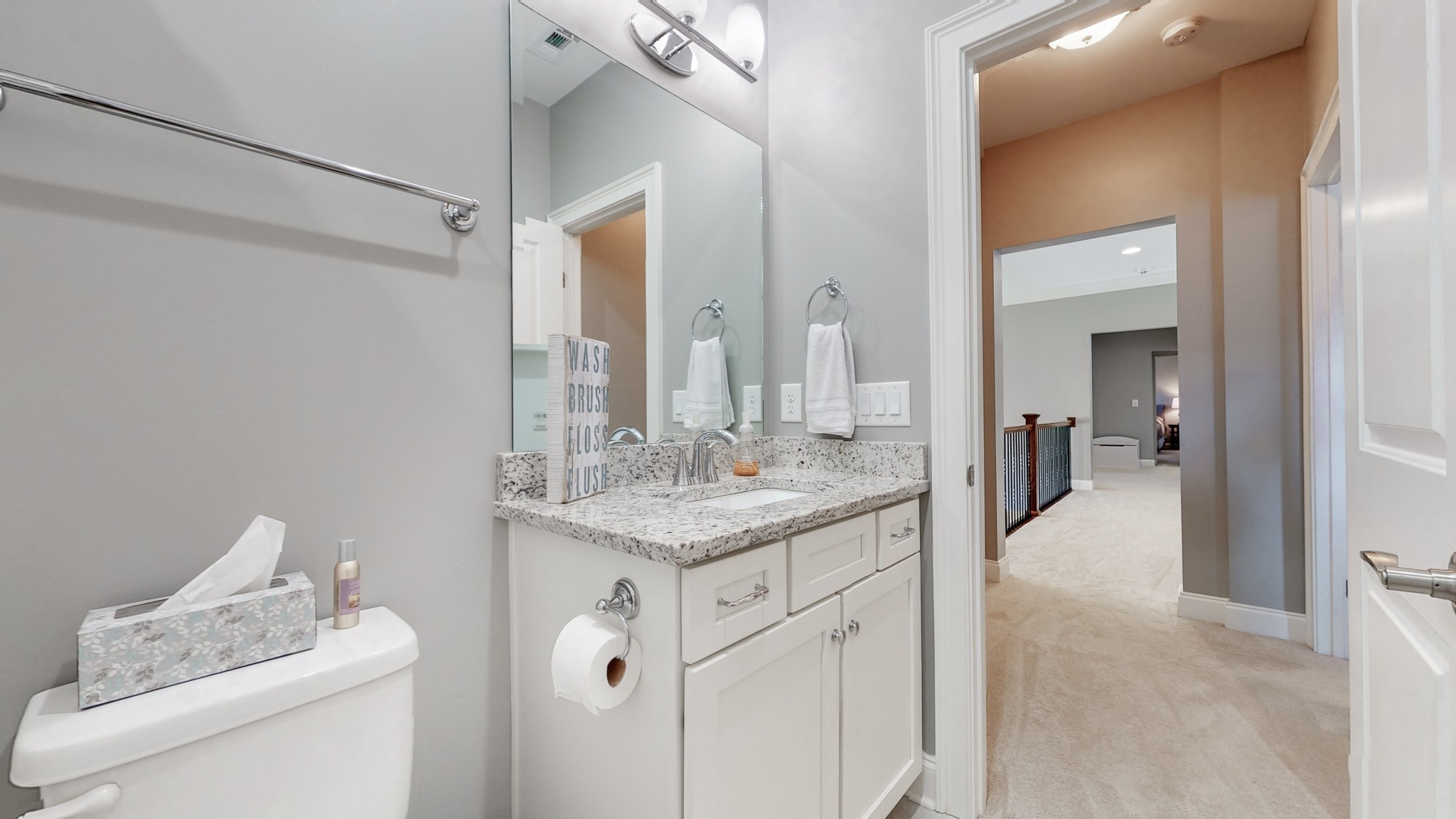 6023 Lookaway Circle Franklin, TN 37067 - Photo 39 of 50 a bathroom with a granite countertop sink a toilet and a mirror