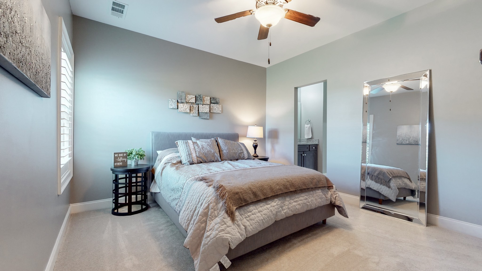 6023 Lookaway Circle Franklin, TN 37067 - Photo 40 of 50 a bedroom with a bed and a chandelier