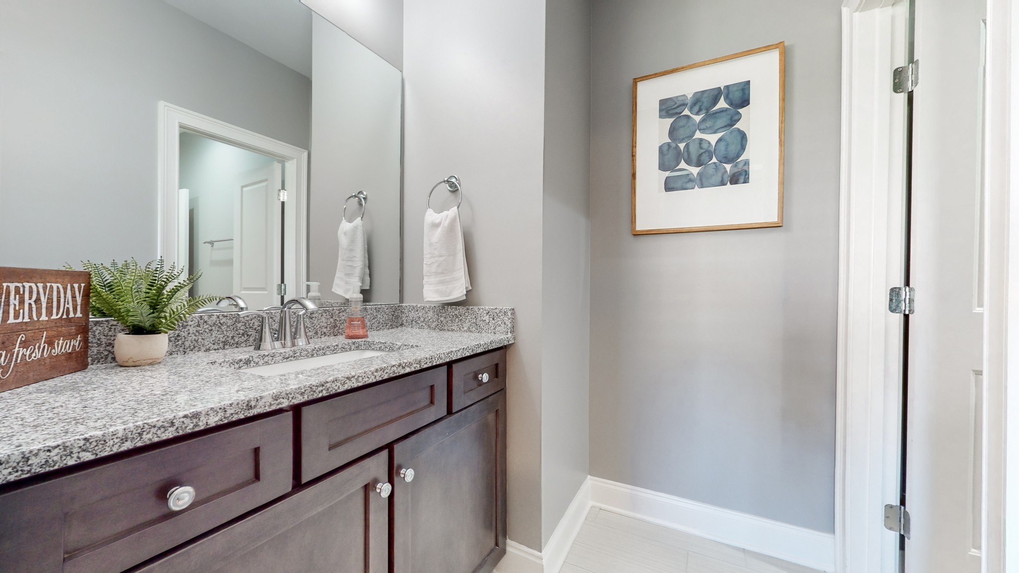 6023 Lookaway Circle Franklin, TN 37067 - Photo 41 of 50 a bathroom with a granite countertop sink and a mirror