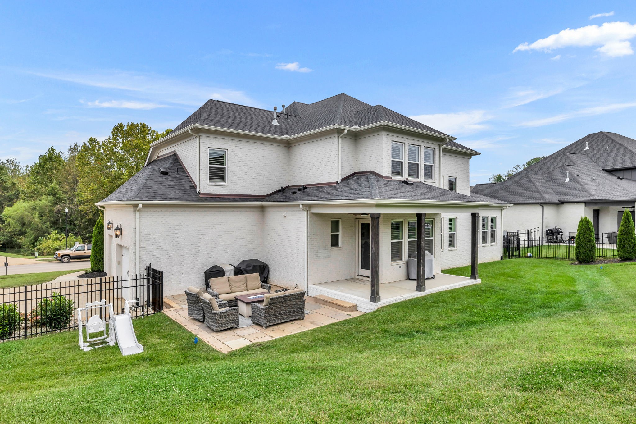 6023 Lookaway Circle Franklin, TN 37067 - Photo 47 of 50 a view of a house with backyard porch and garden