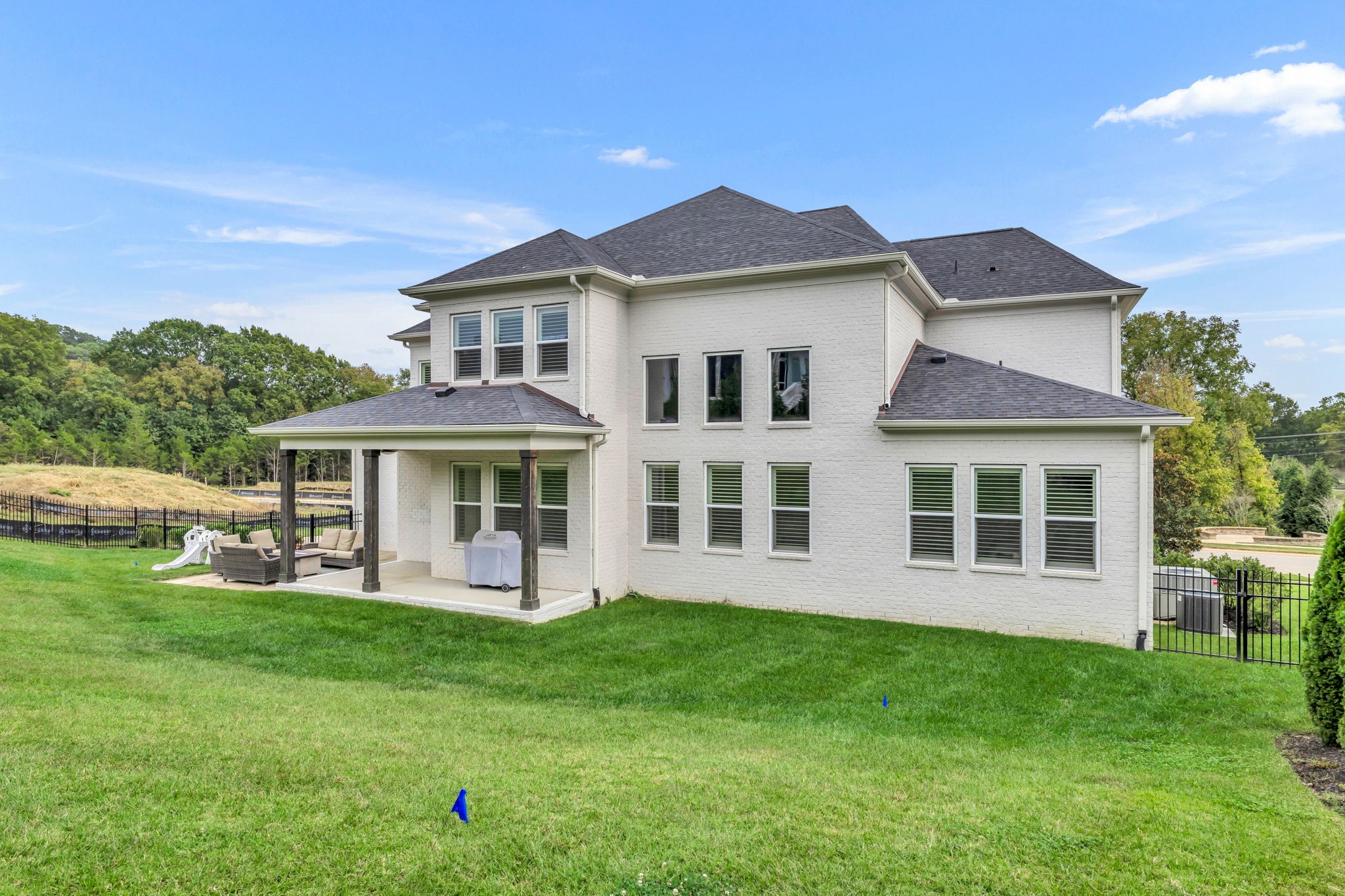6023 Lookaway Circle Franklin, TN 37067 - Photo 50 of 50 a view of a house with a yard and potted plants