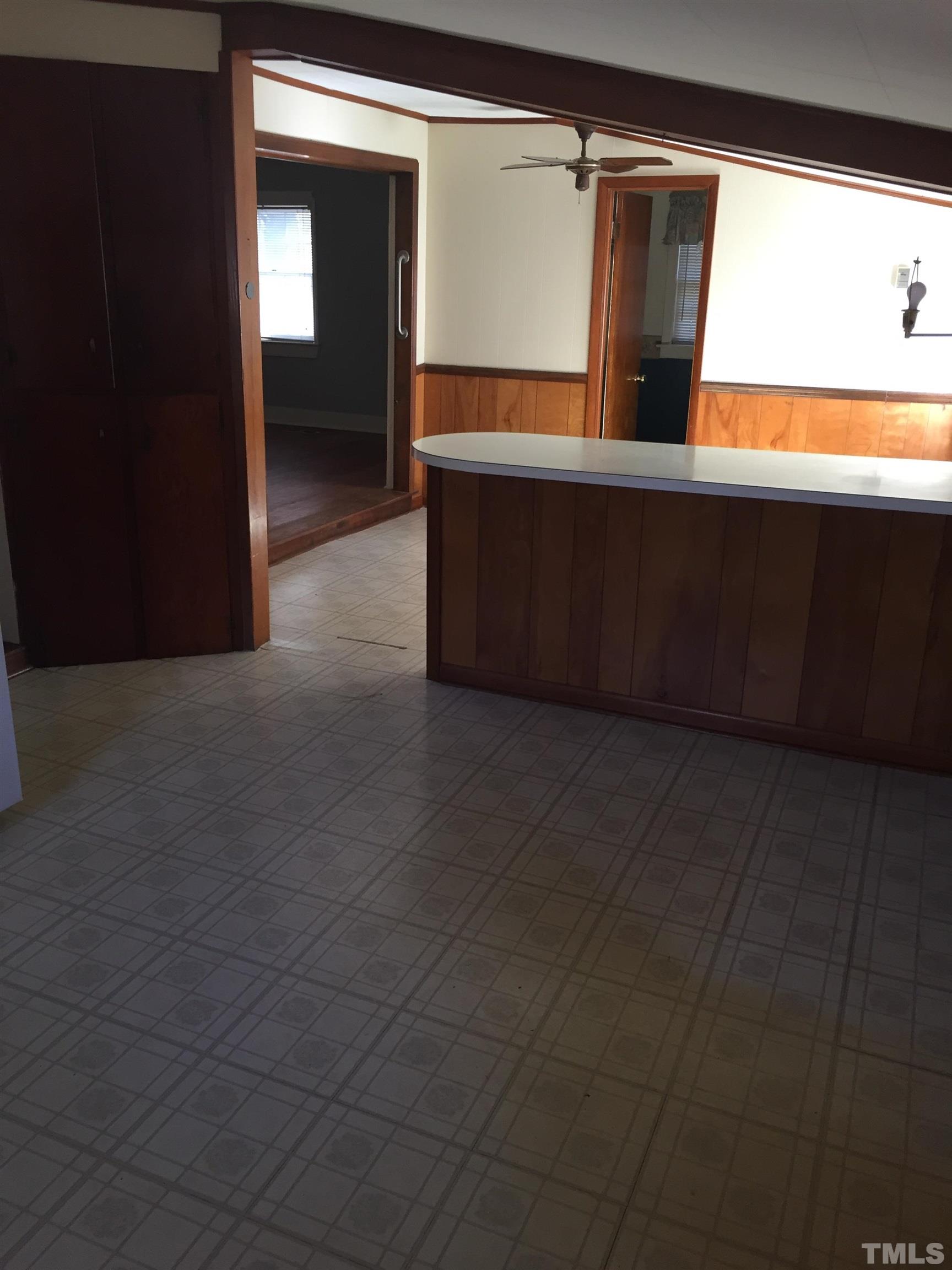 923 Ranch Farm Road Raleigh, NC 27603 - Photo 6 of 18 a view of an empty room with window