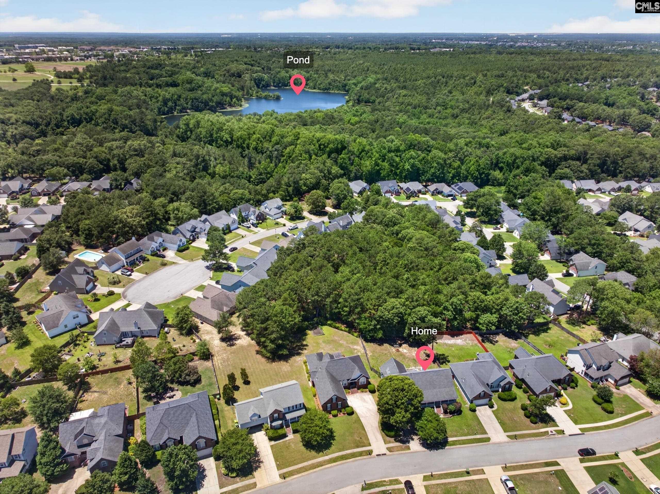 219 Plantation Pointe Drive Elgin, SC 29045 - Photo 51 of 56 an aerial view of residential houses with outdoor space and trees