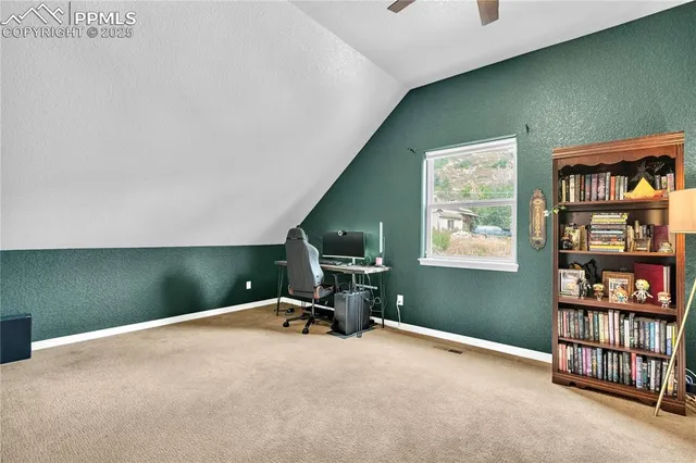 a workspace with furniture and window