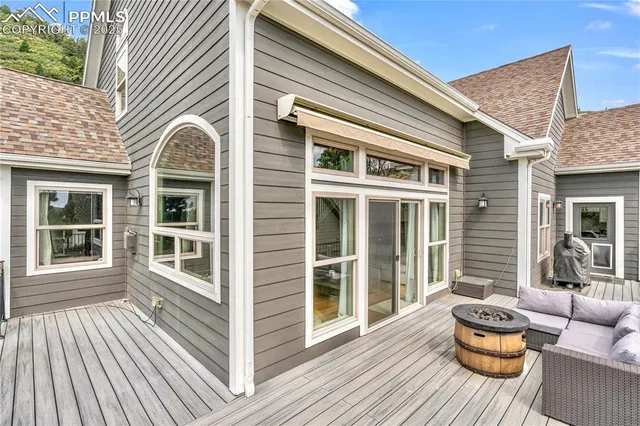 a view of a house with a lounge chair