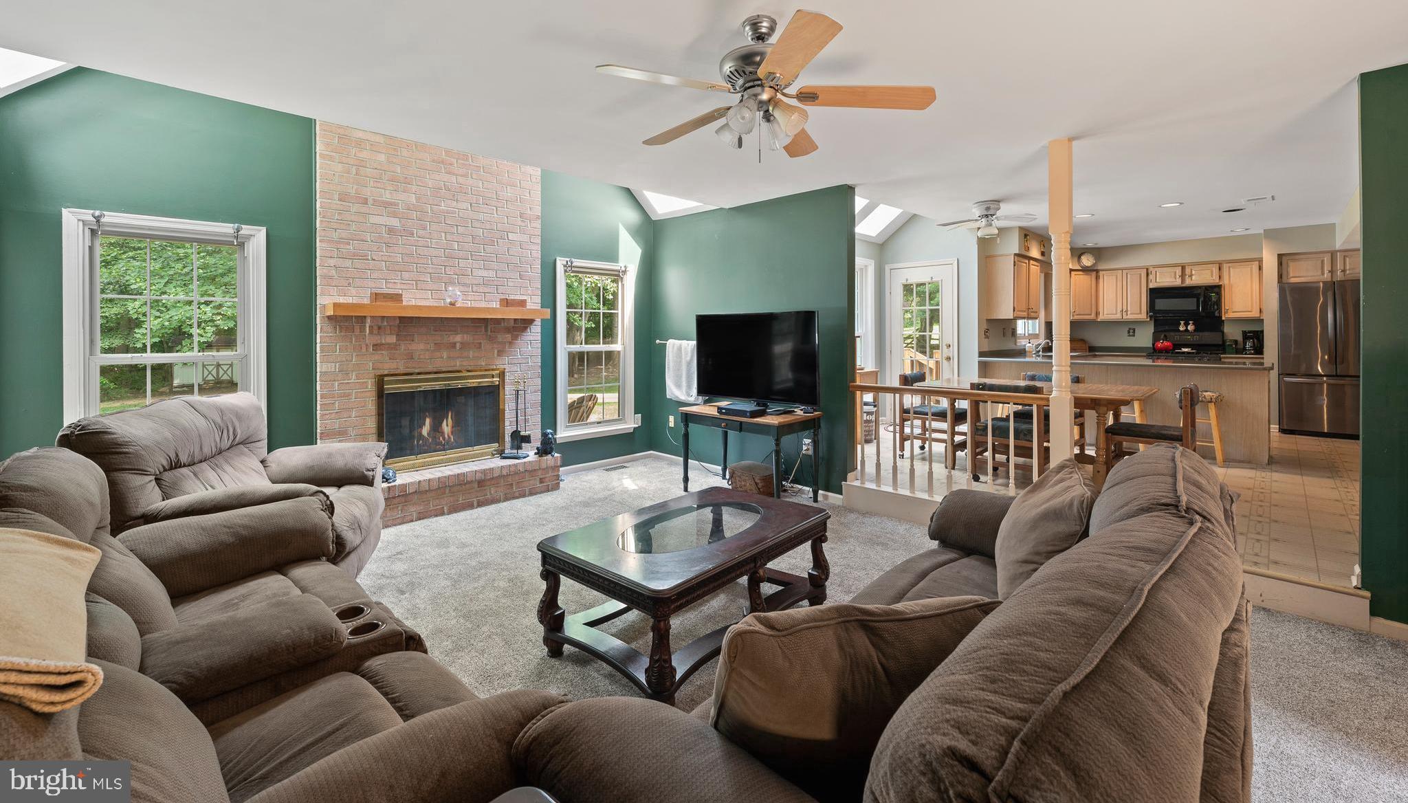 815 Shadow Farm Road West Chester, PA 19380 - Photo 7 of 35 Family Room with Skylights and Gas Fireplace