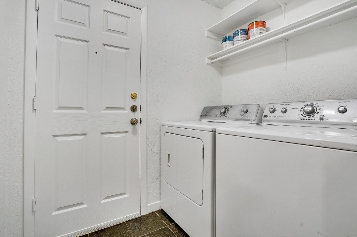 3201 Twinberry Cove, Unit B Austin, TX 78746 - Photo 11 of 19 a utility room with dryer and washer