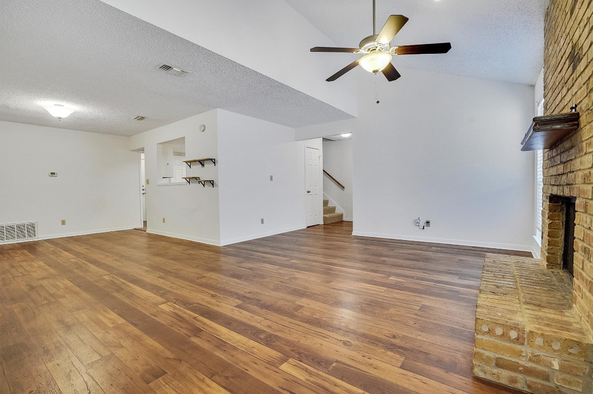 3201 Twinberry Cove, Unit B Austin, TX 78746 - Photo 4 of 19 a view of empty room with ceiling fan