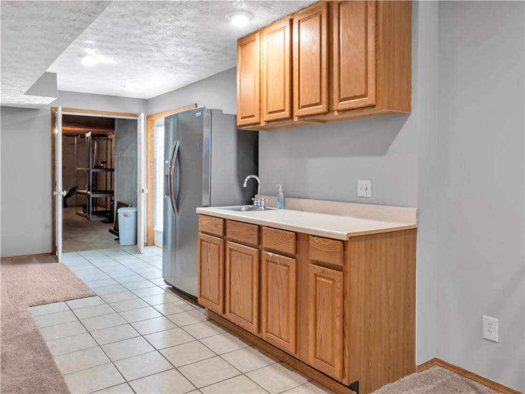 25 Callaway Springboro, OH 45066 - Photo 39 of 51 This versatile area includes a convenient wet bar, perfect for entertaining or daily use.