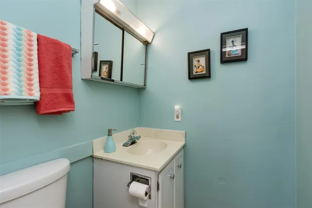 a bathroom with a sink and a toilet
