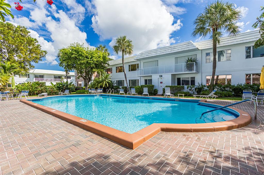 350 South Cypress Road, Unit 522 Pompano Beach, FL 33060 - Photo 20 of 27 a view of a house with swimming pool