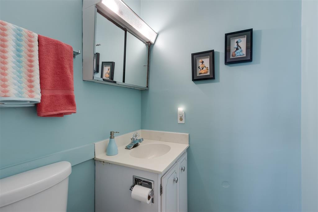 350 South Cypress Road, Unit 522 Pompano Beach, FL 33060 - Photo 26 of 27 a bathroom with a sink and a toilet