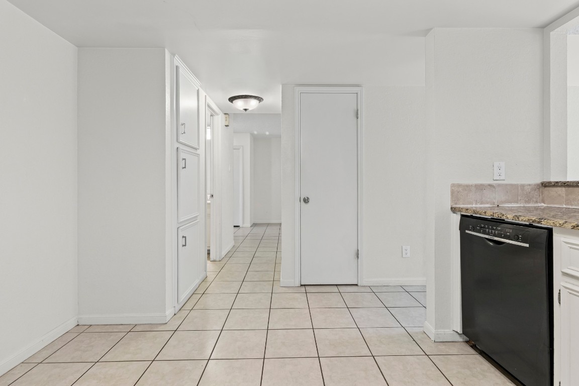8113 Baywood Drive, Unit A Austin, TX 78759 - Photo 11 of 29 a view of an empty room with closet and mirror