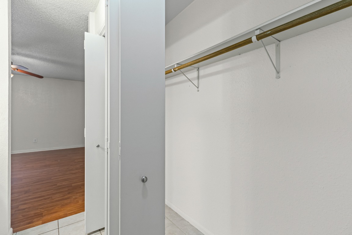 8113 Baywood Drive, Unit A Austin, TX 78759 - Photo 16 of 29 a view of walk in closet