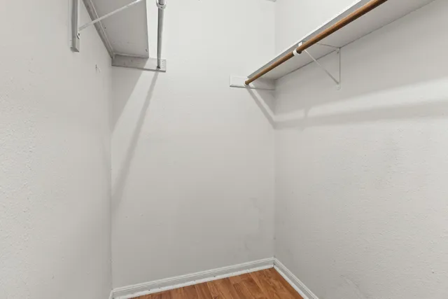 a view of small space with racks on the wall