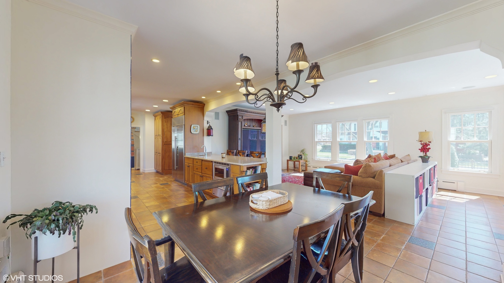 302 North Merrill Street Park Ridge, IL 60068 - Photo 7 of 40 a view of a dining room with furniture and a chandelier