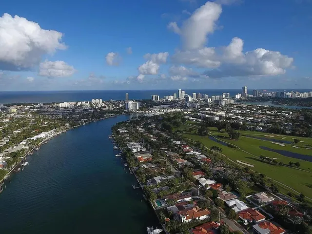 a view of a lake with a city
