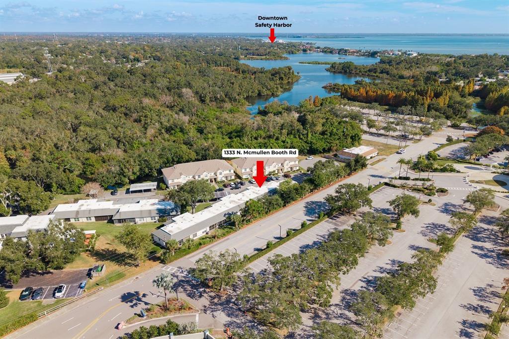 1333 McMullen Booth Road, Unit 1333 Clearwater, FL 33759 - Photo 24 of 26 an aerial view of residential houses with outdoor space