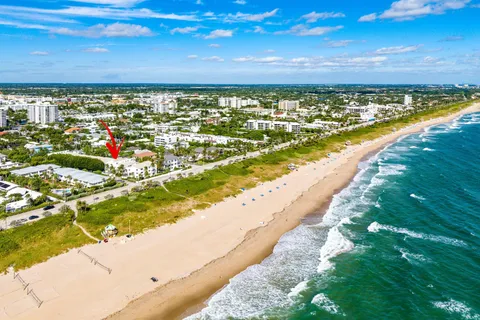 a view of an ocean and city