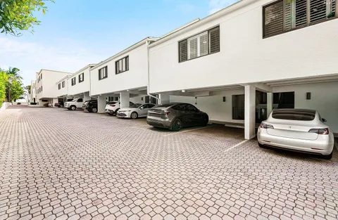 a view of a street with cars