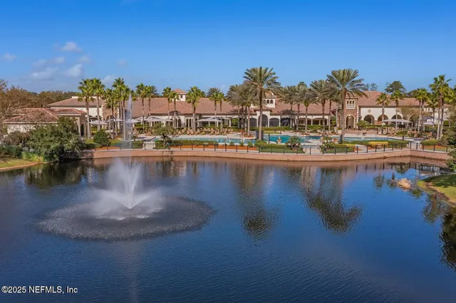a view of a lake with a city