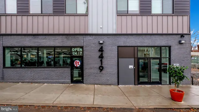 a front view of a house with glass windows