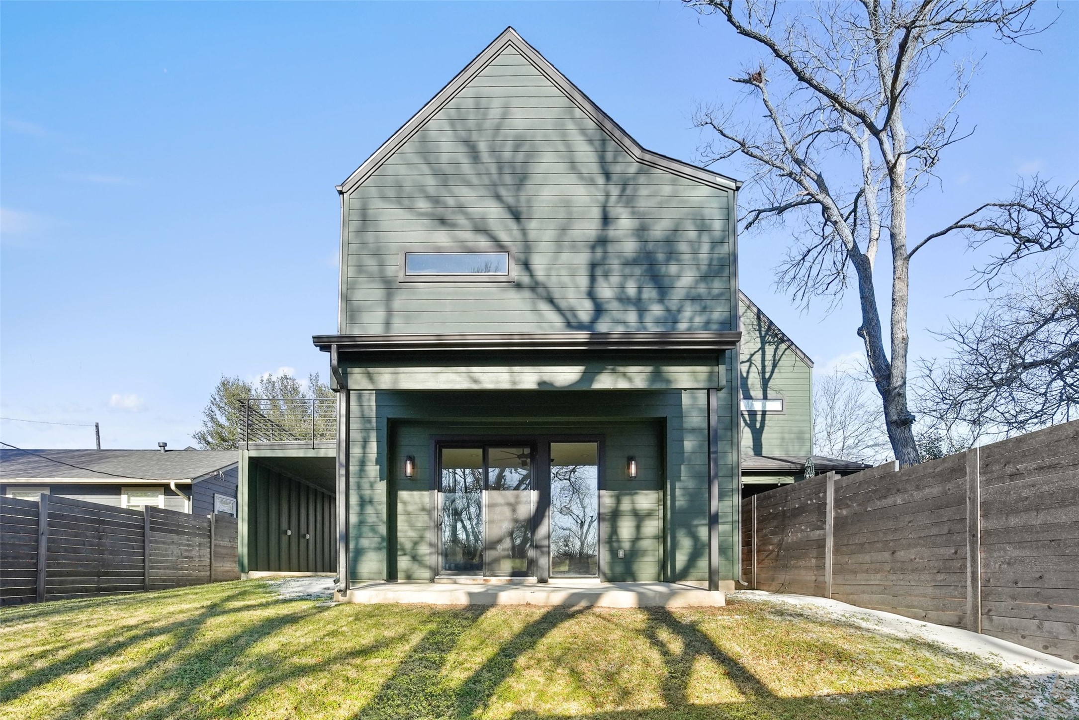 5109 Stone Gate Drive, Unit 2 Austin, TX 78721 - Photo 22 of 23 Back of property featuring a fenced backyard