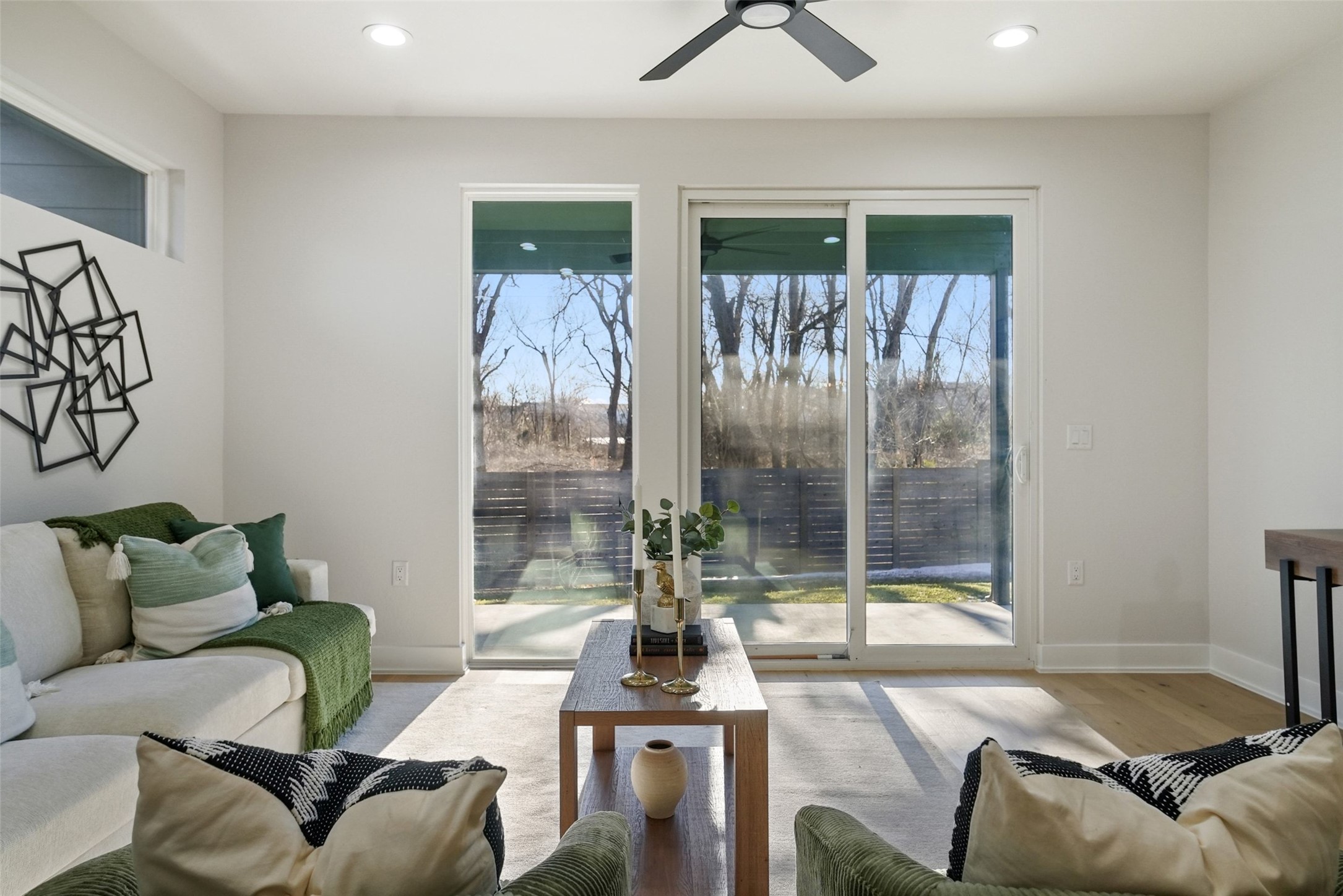 5109 Stone Gate Drive, Unit 2 Austin, TX 78721 - Photo 7 of 23 Living area with wood finished floors, ceiling fan, and recessed lighting