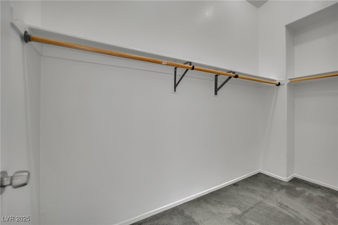2218 Ramsgate Drive Henderson, NV 89074 - Photo 11 of 33 Spacious closet with dark colored carpet