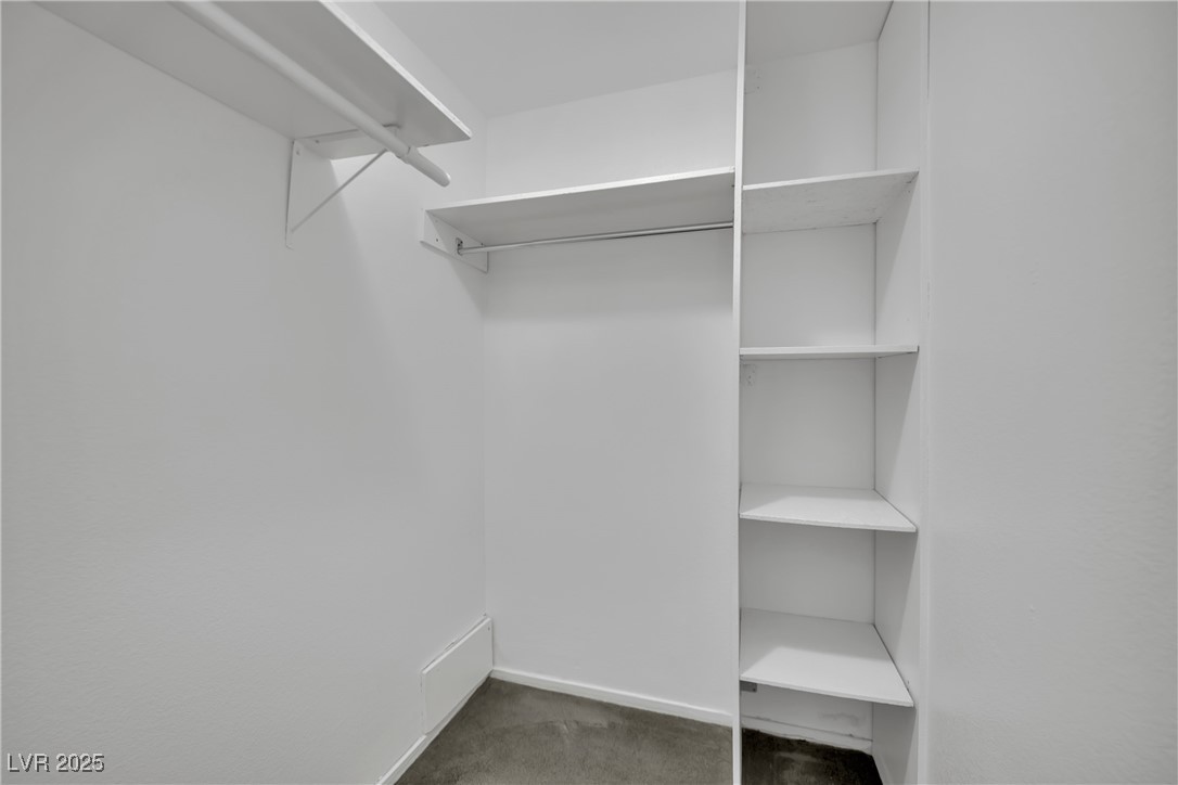 2218 Ramsgate Drive Henderson, NV 89074 - Photo 25 of 33 Spacious closet with dark colored carpet