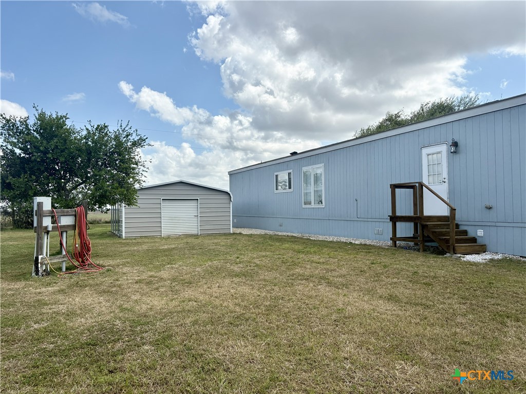 259 Hambleton Road Victoria, TX 77905 - Photo 8 of 37 Rear entry and storage