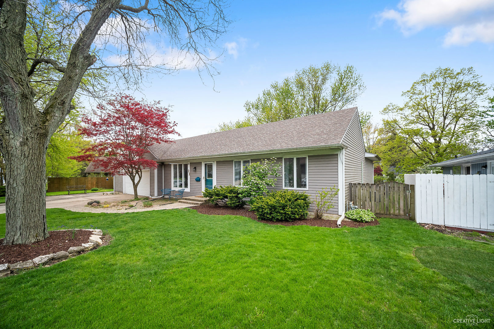 23 Aldon Road Montgomery, IL 60538 - Photo 2 of 31 a front view of a house with a yard and trees